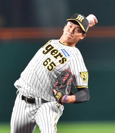 阪神・湯浅　魂の１球火消し！３-３八回大ピンチで６・１５以来の登板 岡田マジック「ここは湯浅に懸けるしかない」