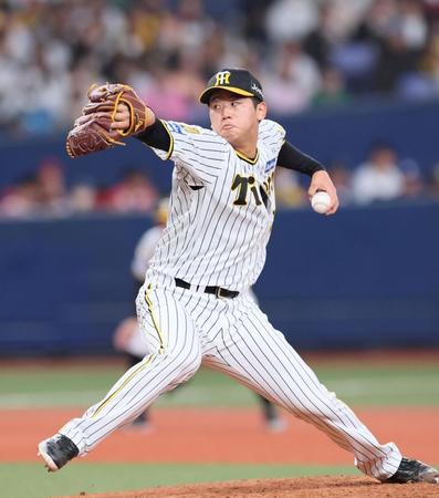 　６回に２番手として登板して力投する門別（撮影・立川洋一郎）