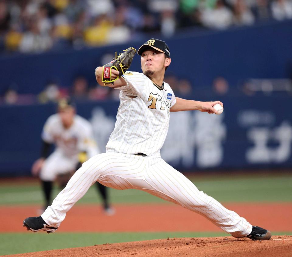 　力投する先発の伊藤将
