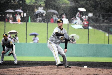 　４回、雨中の中で粘投する高橋