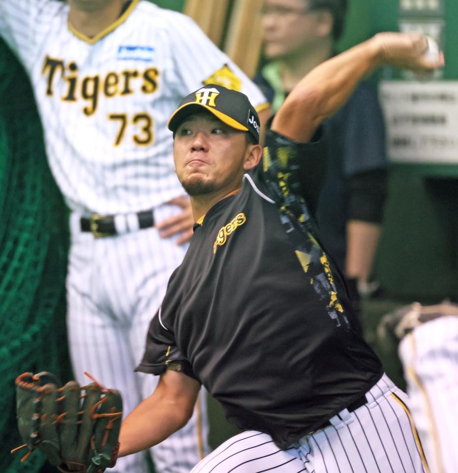 　キャッチボールする伊藤将（撮影・立川洋一郎）