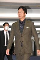 　スタッフ会議会場に向かう藤川監督（撮影・北村雅宏）