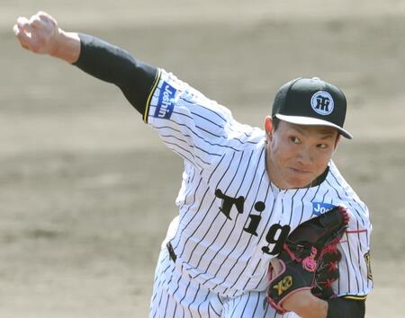 　打者を相手に投げ込む湯浅（撮影・田中太一）