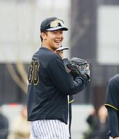 　練習中、笑顔を見せる門別（撮影　山口登）