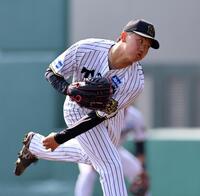 　先発し力投する門別（撮影・山口登）