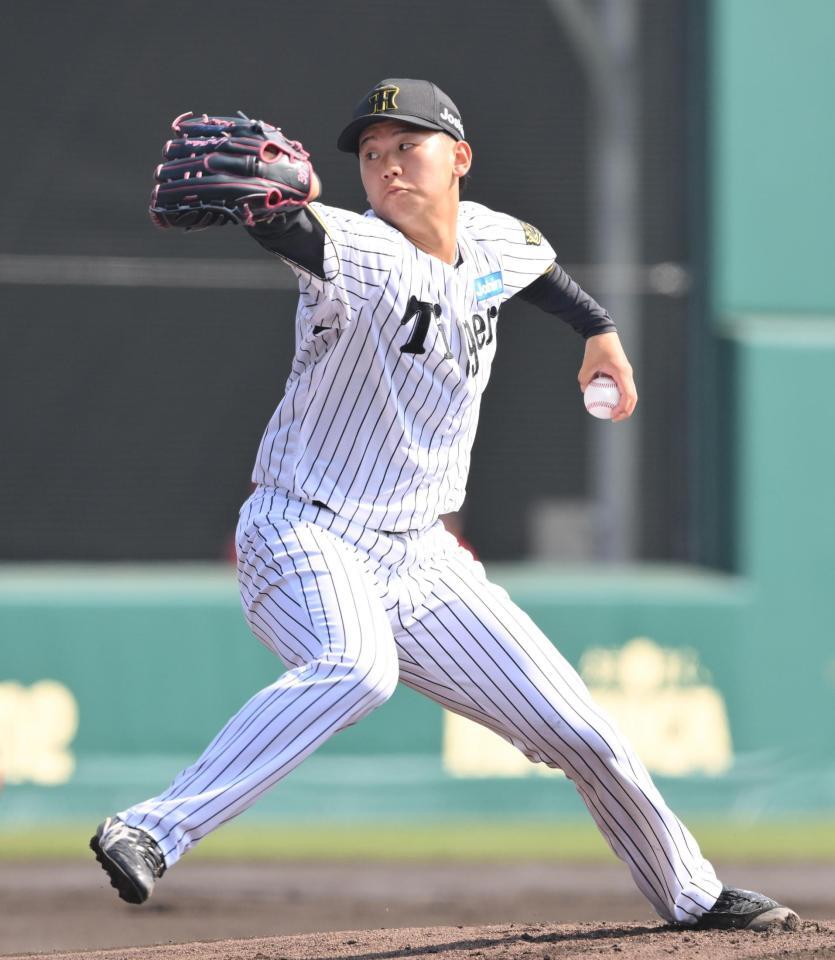 　力投する先発の門別（撮影・西田忠信）