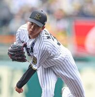 　力投する先発投手の門別（撮影・中田匡峻）
