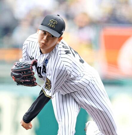 　力投する先発投手の門別（撮影・中田匡峻）