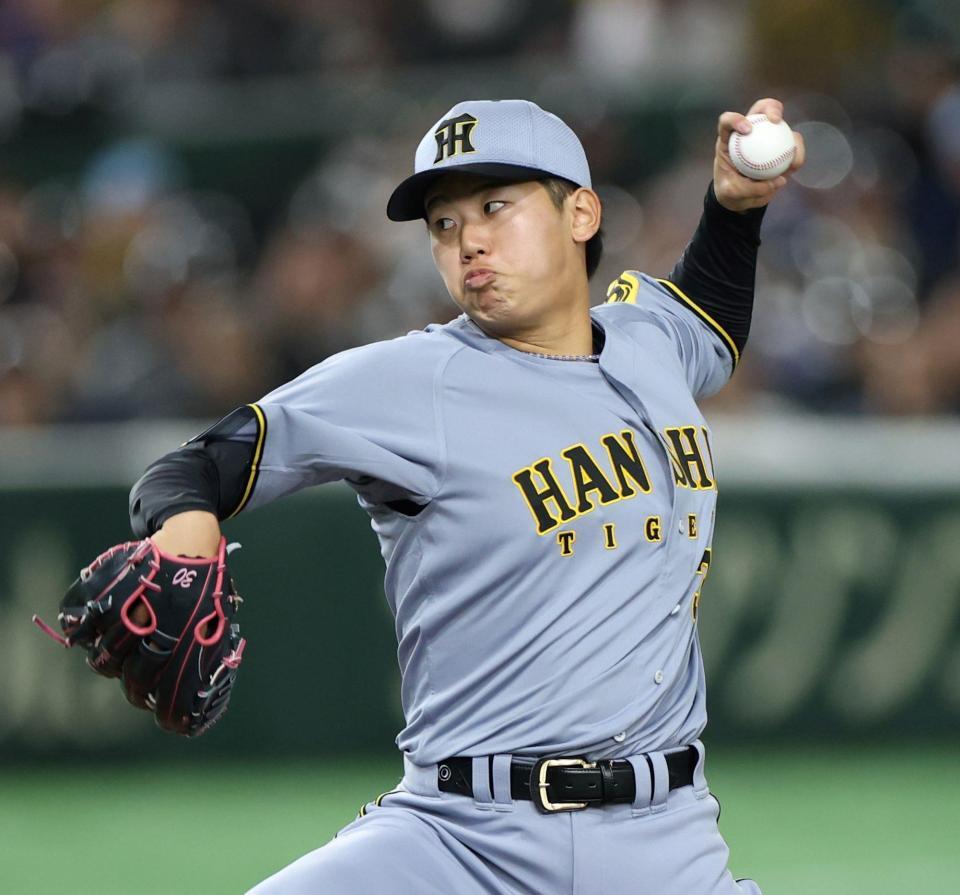 　力投する先発の門別（撮影・中田匡峻）