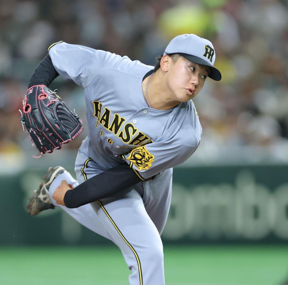 　３回、カブス打線を相手に力投する門別（撮影・西岡正）