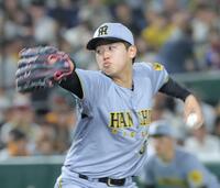 　巨人打線を相手に力投する門別（撮影・西岡正）