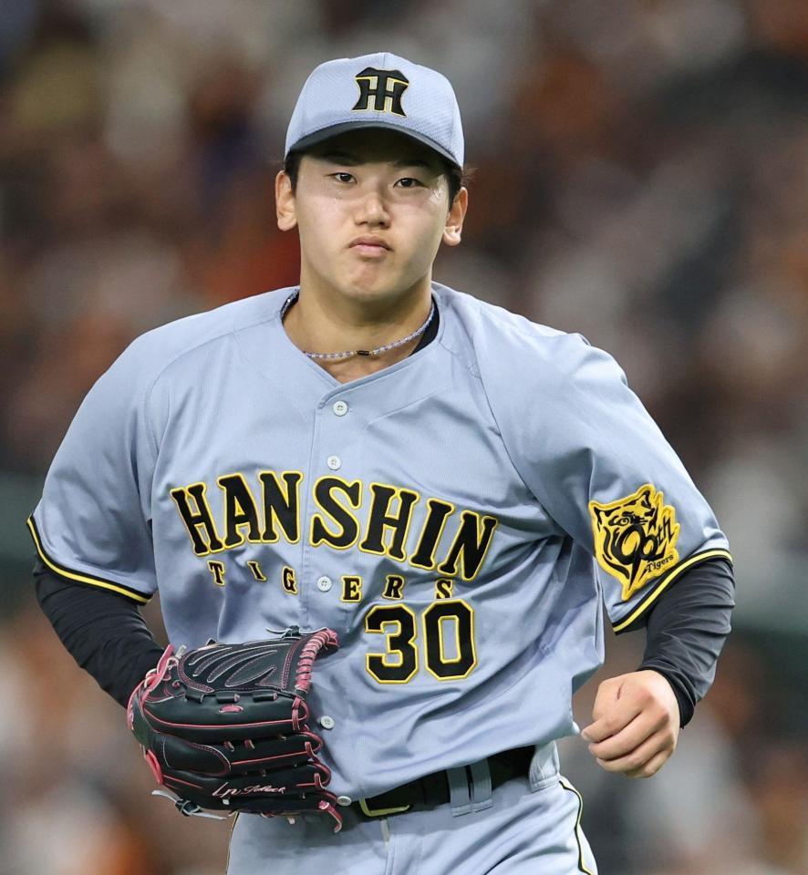 　４回、岡本を空振り三振に斬り、気合の入った表情を見せる門別（撮影・中田匡峻）