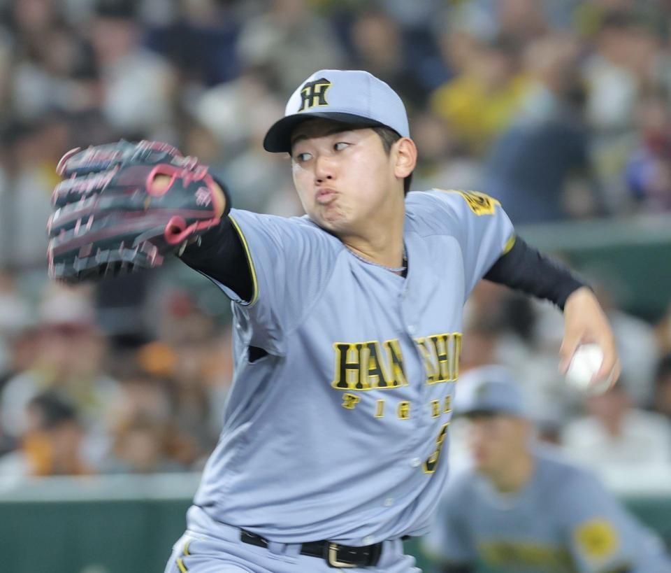 　巨人打線を相手に力投する門別（撮影・西岡正）