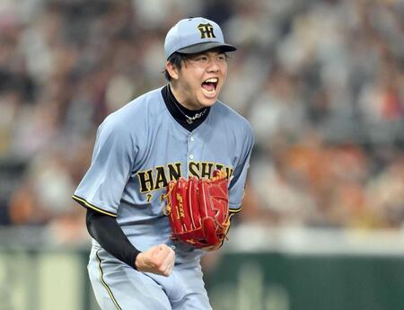 　３回、甲斐を空振り三振に仕留め、雄たけびを上げる才木（撮影・堀内翔）