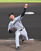 　力投する先発の門別（撮影・西田忠信）