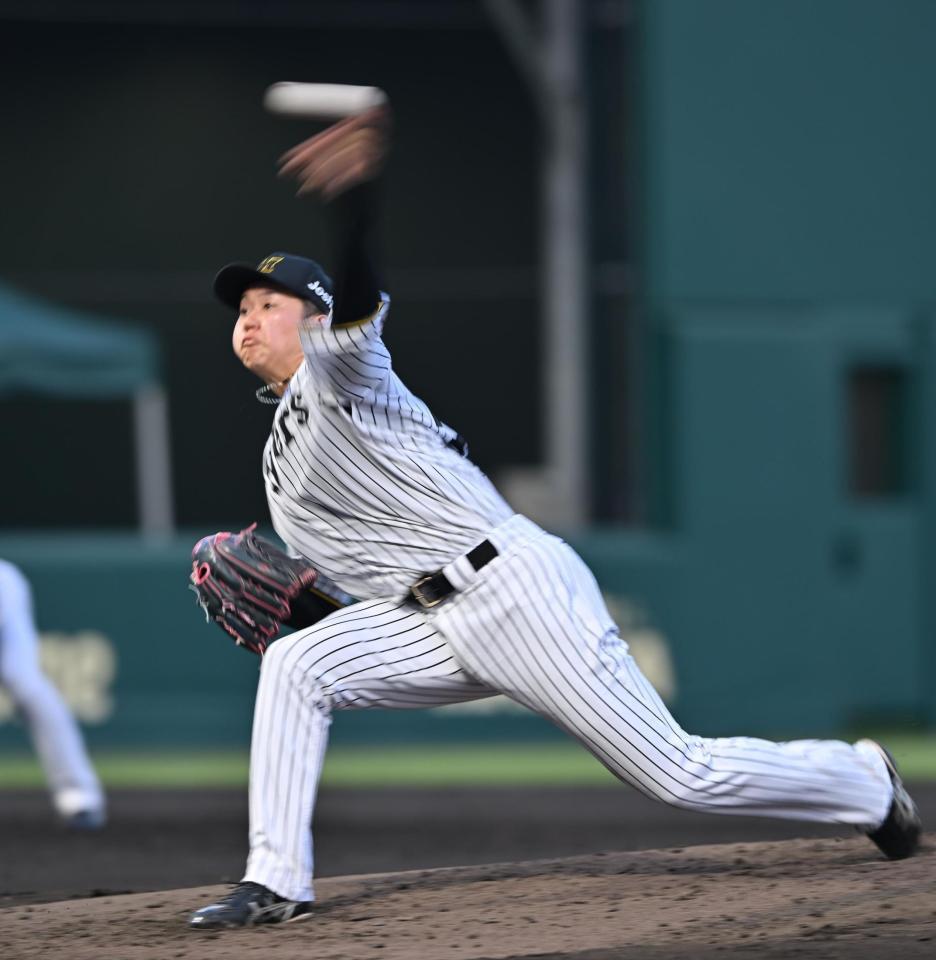 　力投する先発の門別（撮影・西田忠信）