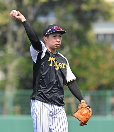 　キャッチボールで調整する石井（撮影・西田忠信）