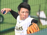 　調整する石井（撮影・飯室逸平）