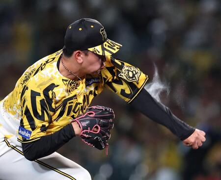 　汗を飛ばしながら力投する門別（撮影・北村雅宏）