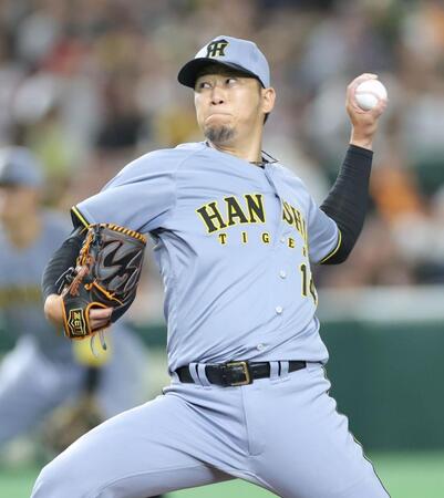 　４回に登板し力投する岩貞（撮影・西岡正）