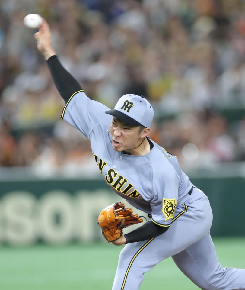 　８回に登板し力投する石井（撮影・西岡正）