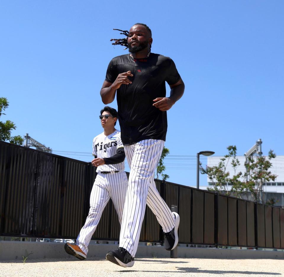 　ランニングするドリス（撮影・北村雅宏）