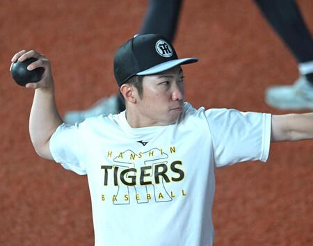 　調整する石井（撮影・飯室逸平）