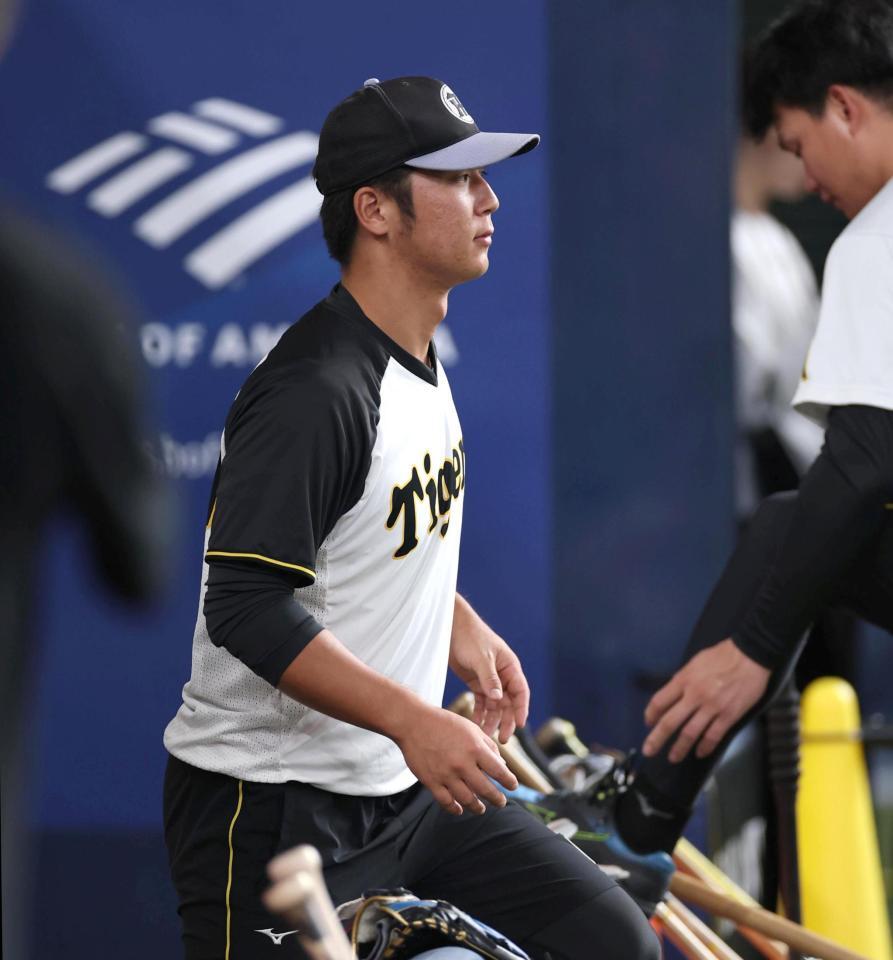 　練習に向かう井坪