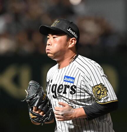 ７回を無失点に抑えベンチに戻る桐敷（撮影・西田忠信）