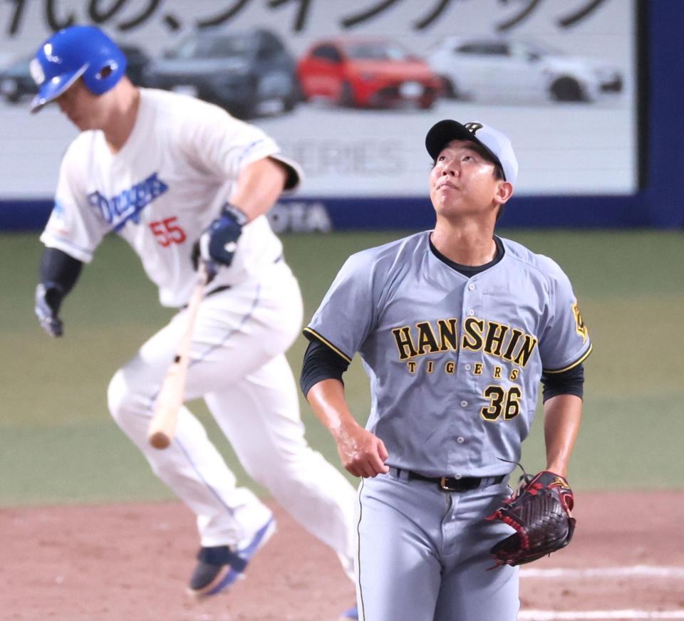 　７回、細川を右飛に打ち取ってこの回無失点に抑える畠（撮影・立川洋一郎）