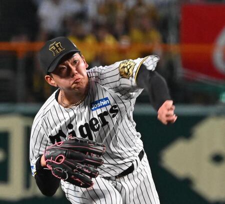 　力投する先発の門別（撮影・西田忠信）