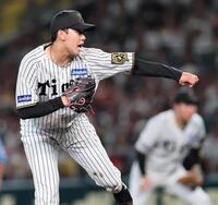 　先発し投げ込む門別（撮影・田中太一）