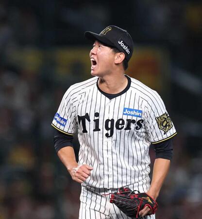 　７回、無失点に抑え、ほえる畠