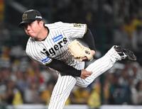 　力投する先発の村上