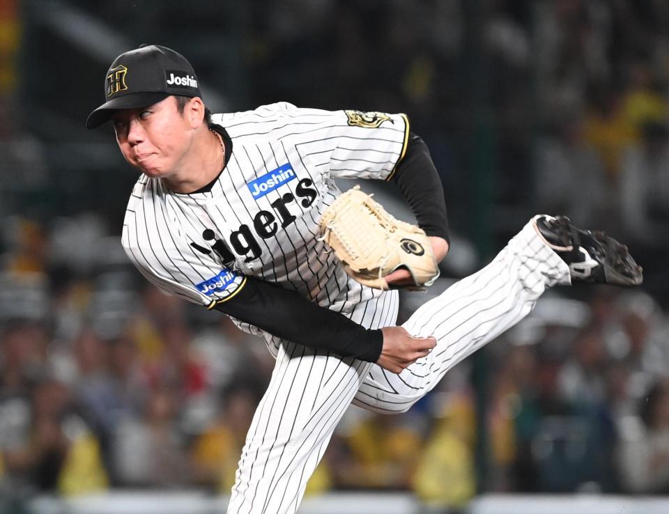 　力投する先発の村上