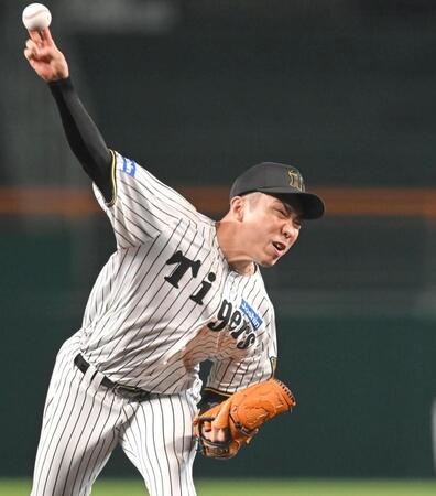 　気迫の投球を見せる石井（撮影・飯室逸平）