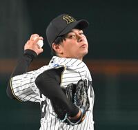 　力投する高橋（撮影・飯室逸平）