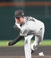 　力投する高橋（撮影・飯室逸平）