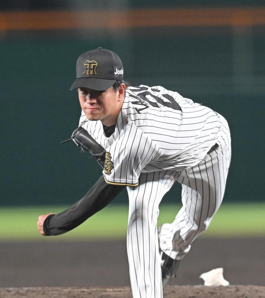 　力投する高橋（撮影・飯室逸平）