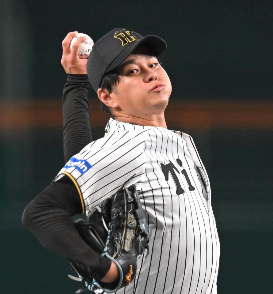 　力投する高橋（撮影・飯室逸平）