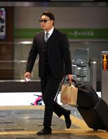 　帰阪する大山（撮影・立川洋一郎）