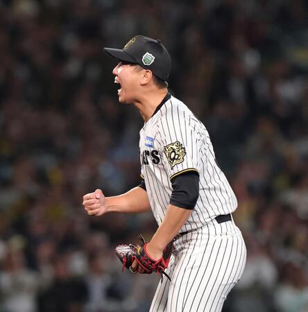 　５回、栗原を空振り三振に斬り、拳を握る畠（撮影・北村雅宏）