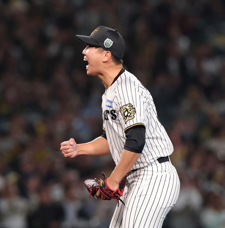 　５回、栗原を空振り三振に斬り、拳を握る畠（撮影・北村雅宏）