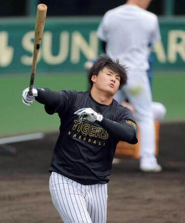 　ロングティーに励む前川