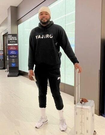 　帰国を前に笑顔を見せるドリス