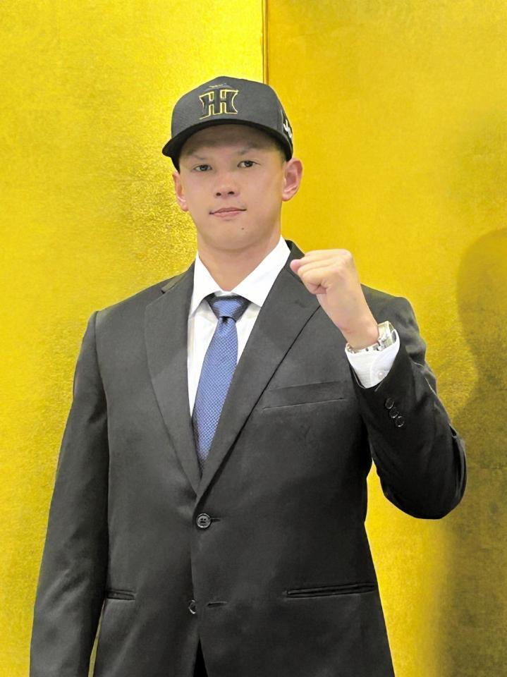 　仮契約を終えた能登