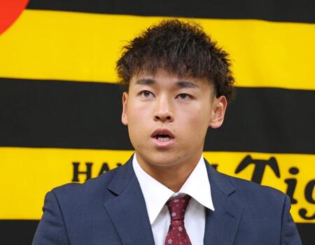 　契約を更改し会見に臨む早川（撮影・立川洋一郎）