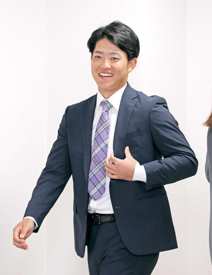 　取材を終えて引き揚げる中川