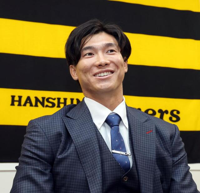 阪神 湯浅が2300万アップの6000万円で更改 難病から復活を遂げ