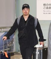 　帰国した佐藤輝